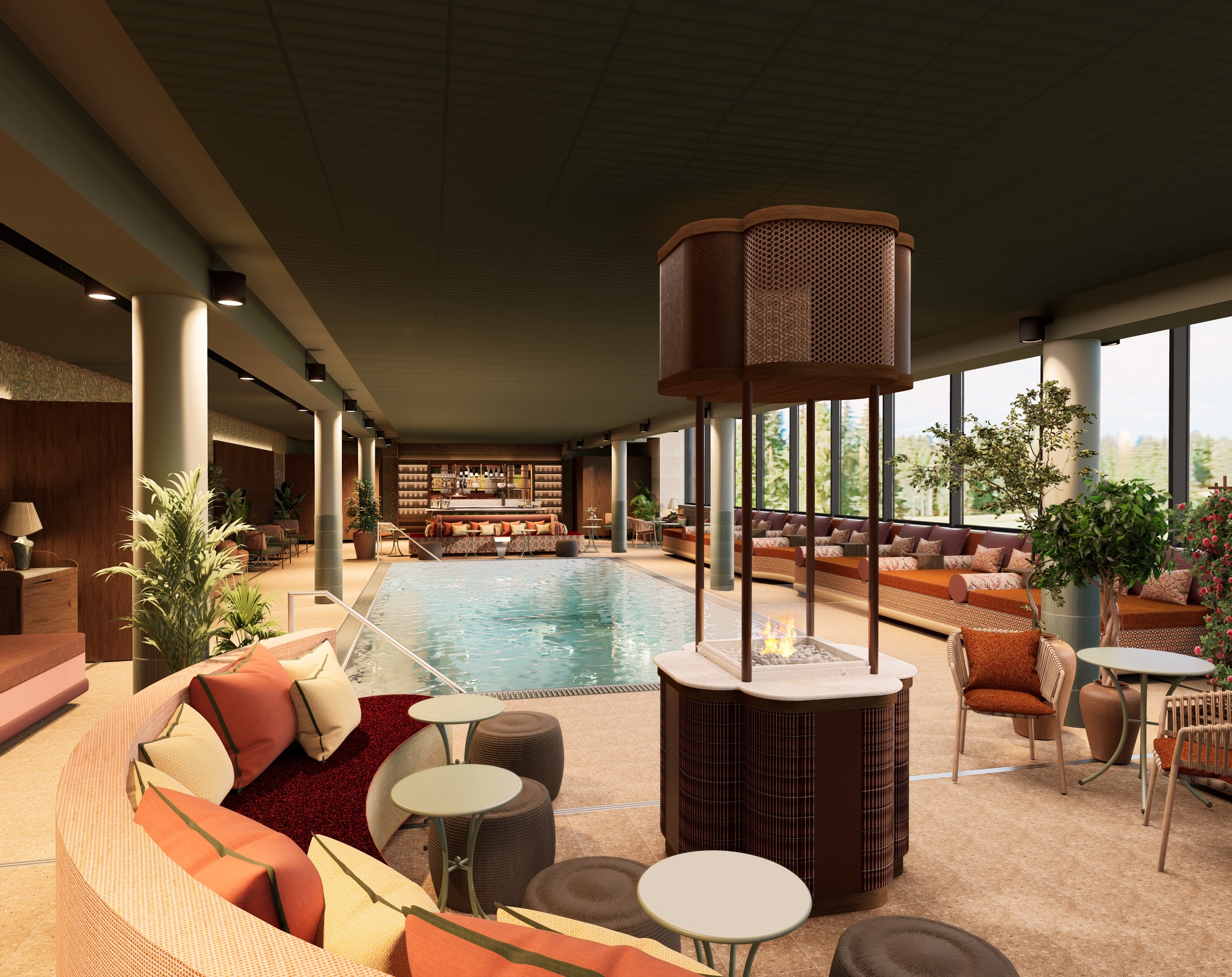 Seating group with a fire feature in front of the panoramic windows, the spa pool and bar in the background.